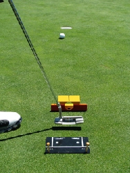 Putting impact system